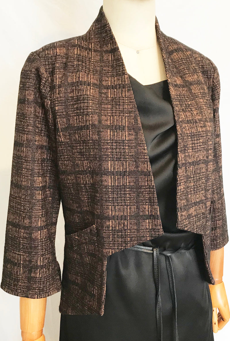 Women's short jacket in rust and black plaid knit