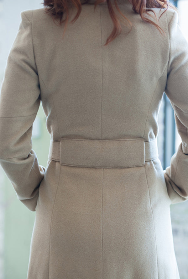 back of camel cashmere coat by denovo