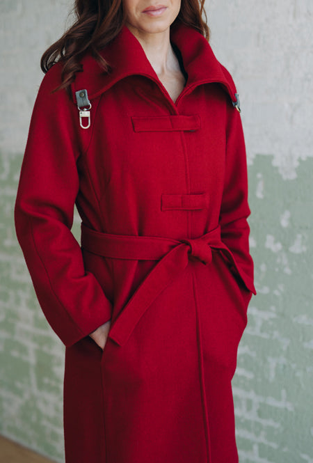 front snap closures of red winter coat